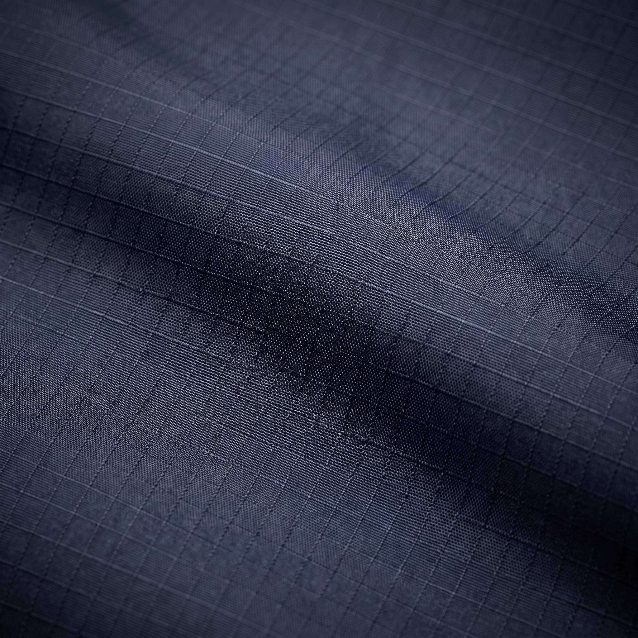 Navy windbreaker ripstop nylon fabric macro